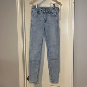 AE next level stretch hi-rise begging light wash